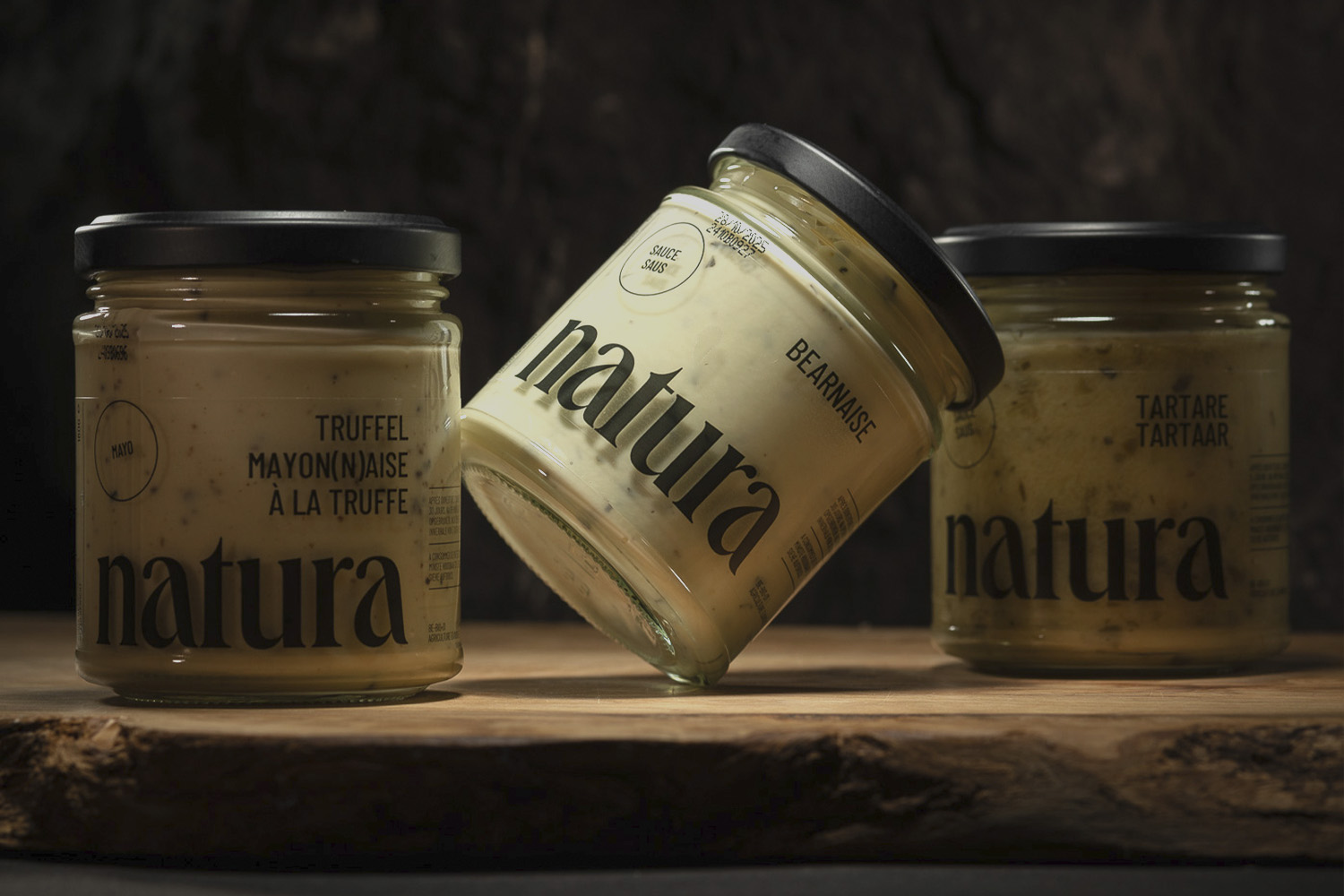 Logo and brand identity for natura and its range of 100% organic mayonnaises, sauces, dressings, and spreads